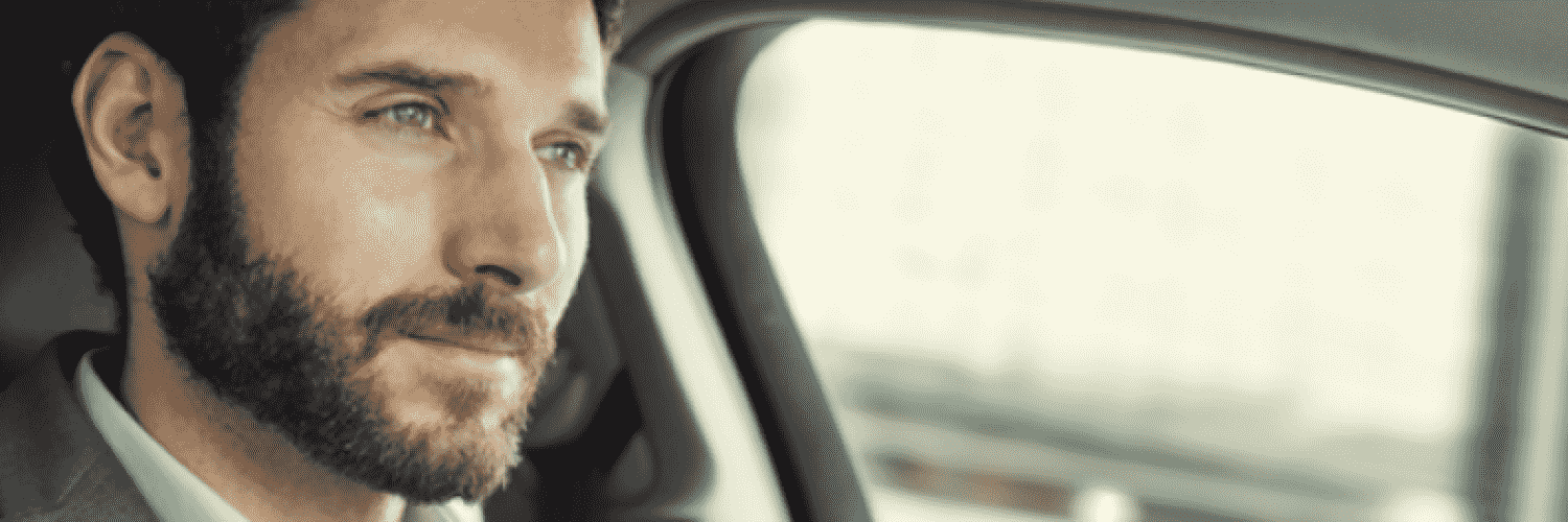 Man in a car driving